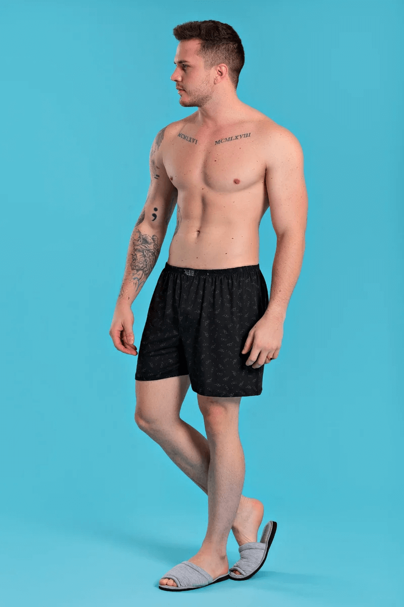 Homem usando short samba cancao